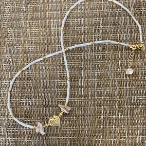 Elegant Gold and White Beaded Necklace